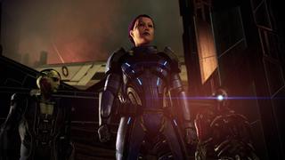 On voit de face Shepard qui se tient devant ses alliés Legion, un robot Geth, et Thane, un humanoîde amphibien, tous les trois déterminés à accomplir leur mission.